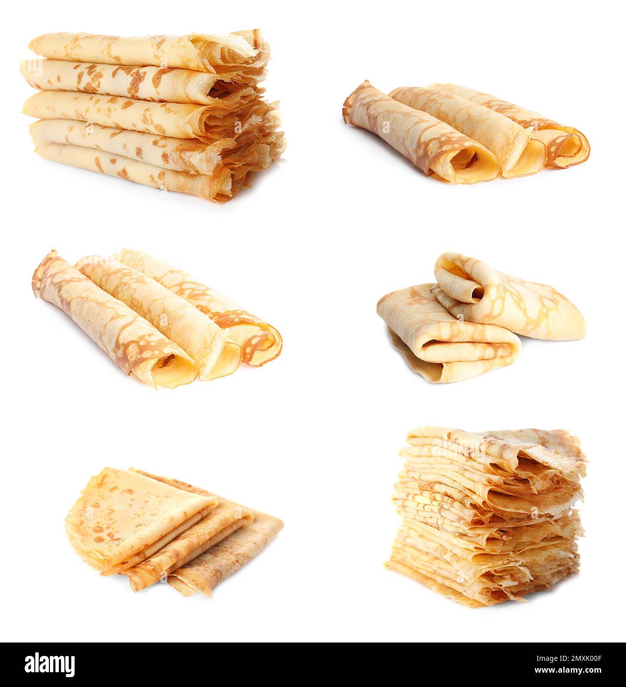 Set di gustosi pancake sottili su sfondo bianco Foto Stock