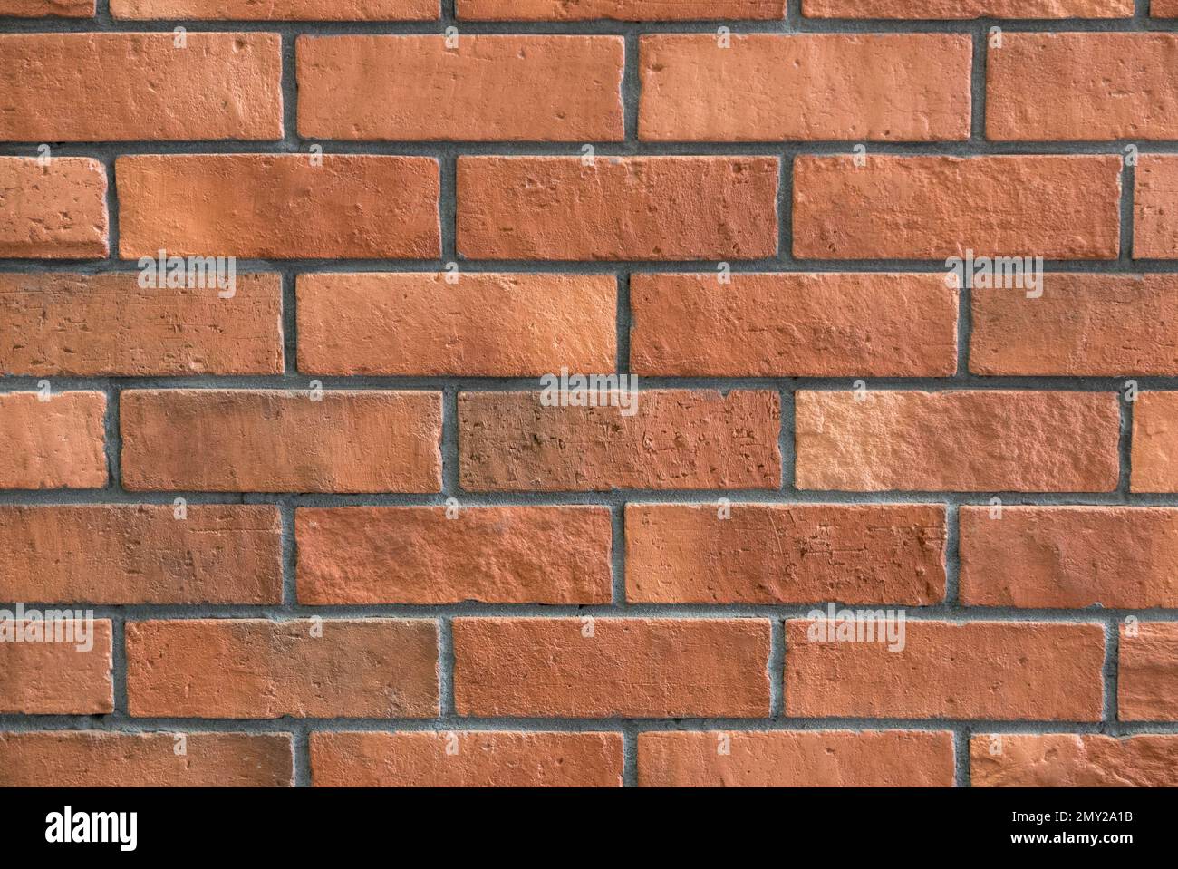 Sfondo parete di mattoni marrone rossiccio. Foto Stock