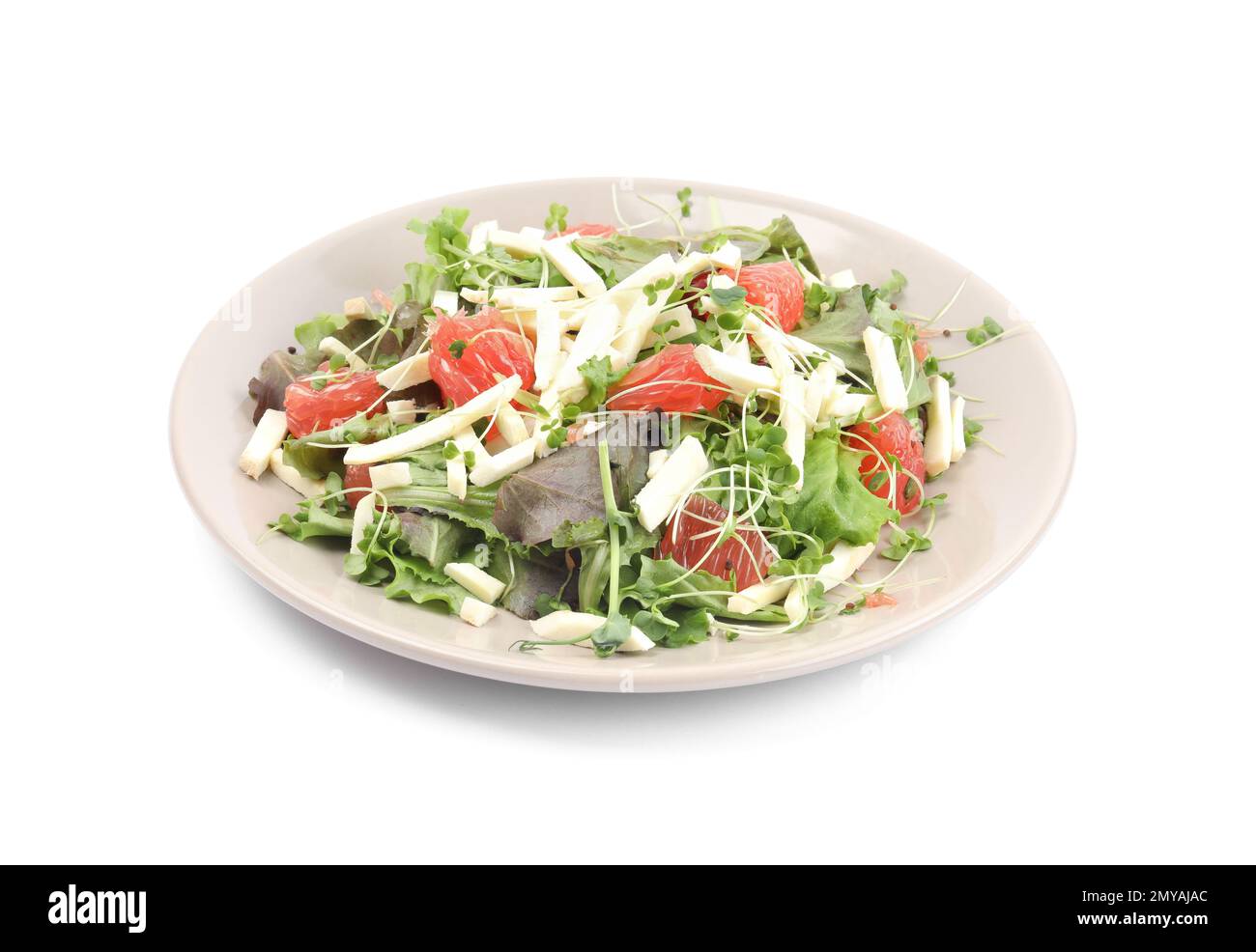 Deliziosa insalata di carote con pompelmo isolato su bianco Foto Stock