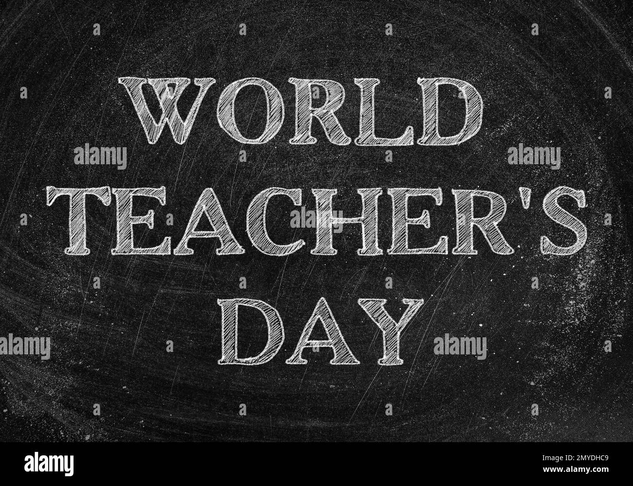 Testo Giornata Mondiale dell'insegnante sulla lavagna. Design del biglietto d'auguri Foto Stock
