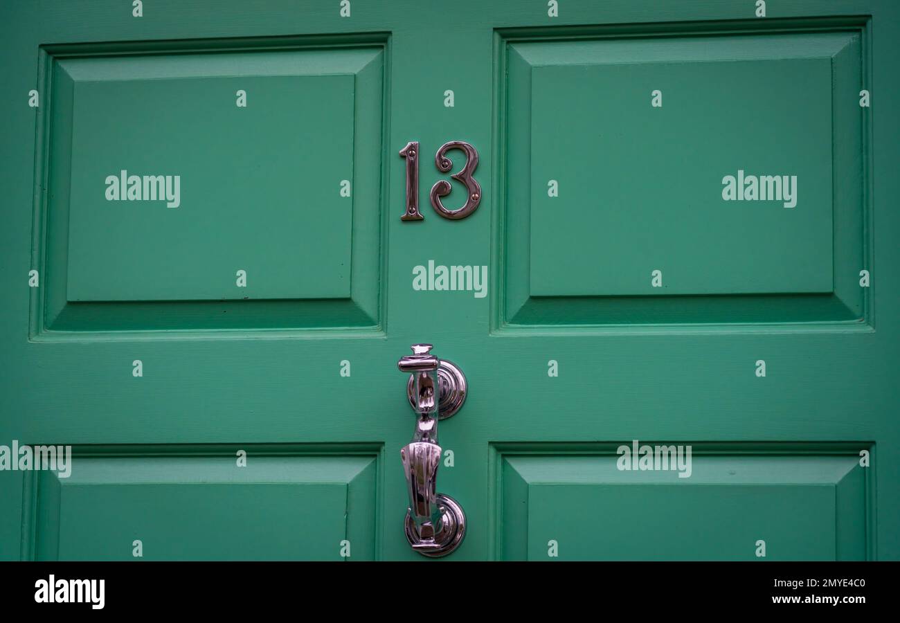 Numero 13 tredici porte di una casa Foto Stock