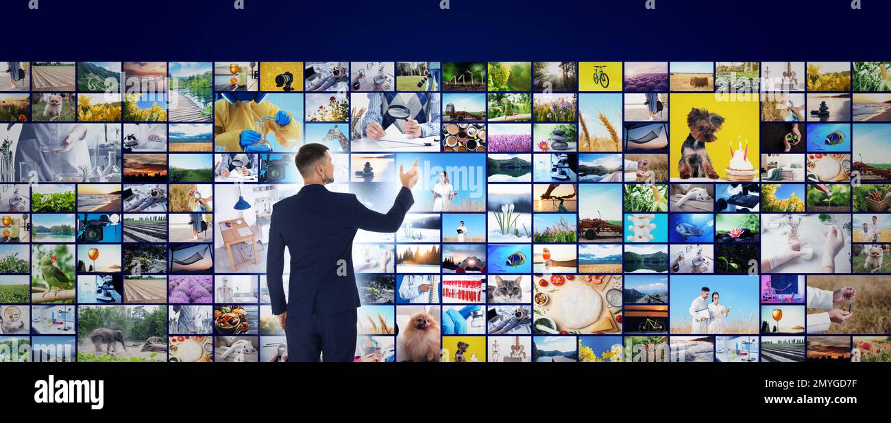 Concetto di libreria multimediale. Uomo che usa la galleria video virtuale, il design del banner Foto Stock