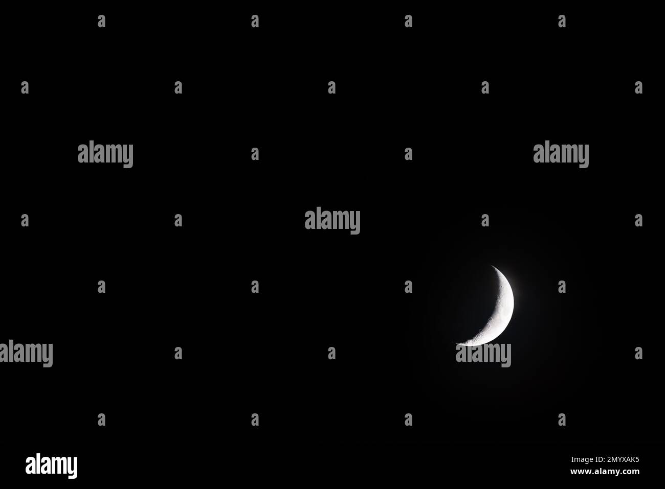 La luna crescente con spazio di copia nero Foto Stock