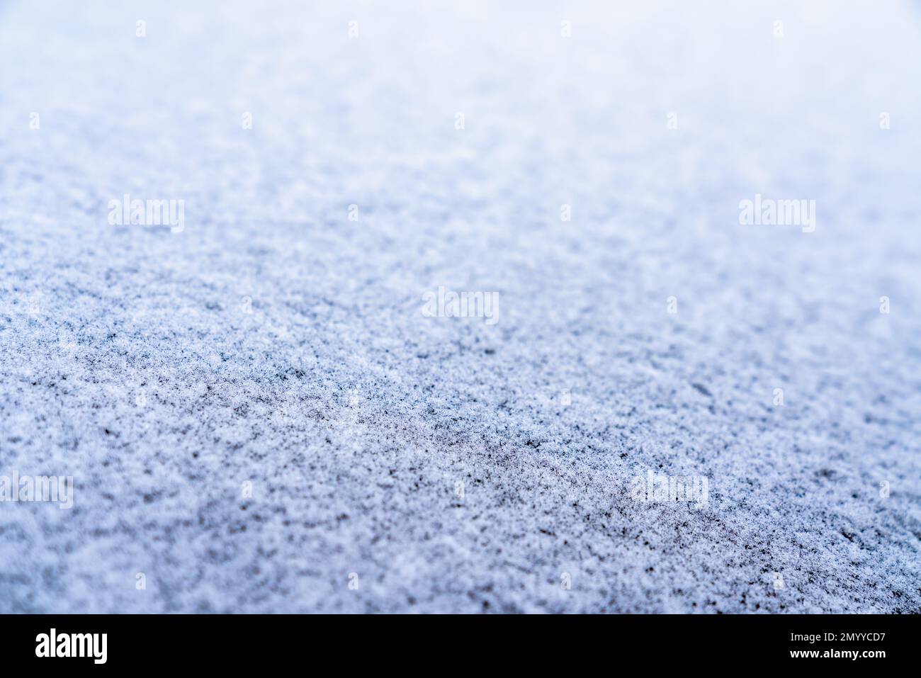Superficie coperta con uno strato di ghiaccio con una profondità di campo bassa Foto Stock