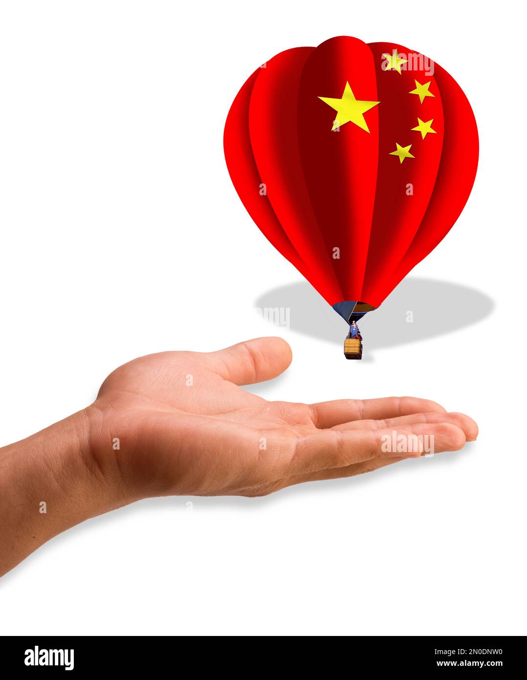 Il pallone della Cina sopra la mano dell'America. Foto Stock