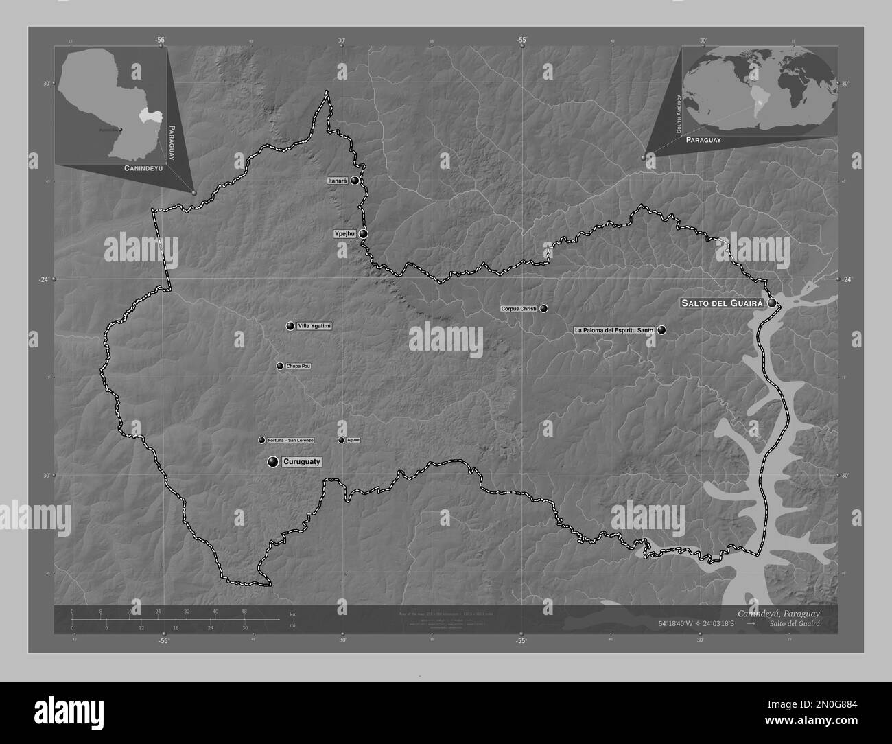 Canindeyu, dipartimento del Paraguay. Mappa in scala di grigi con laghi e fiumi. Località e nomi delle principali città della regione. Angolo ausiliario Foto Stock