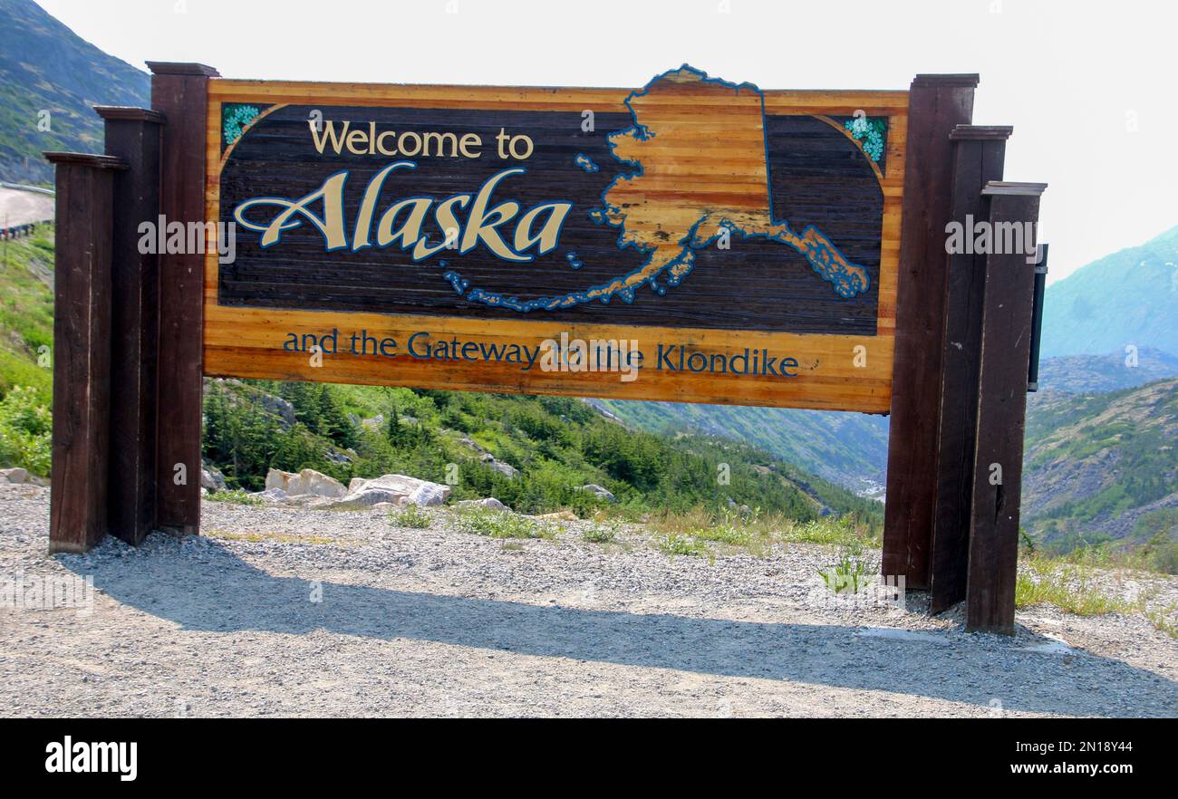 Il confine tra Canada, Yukon Territory e Stati Uniti, Alaska con un fuso orario diverso Foto Stock