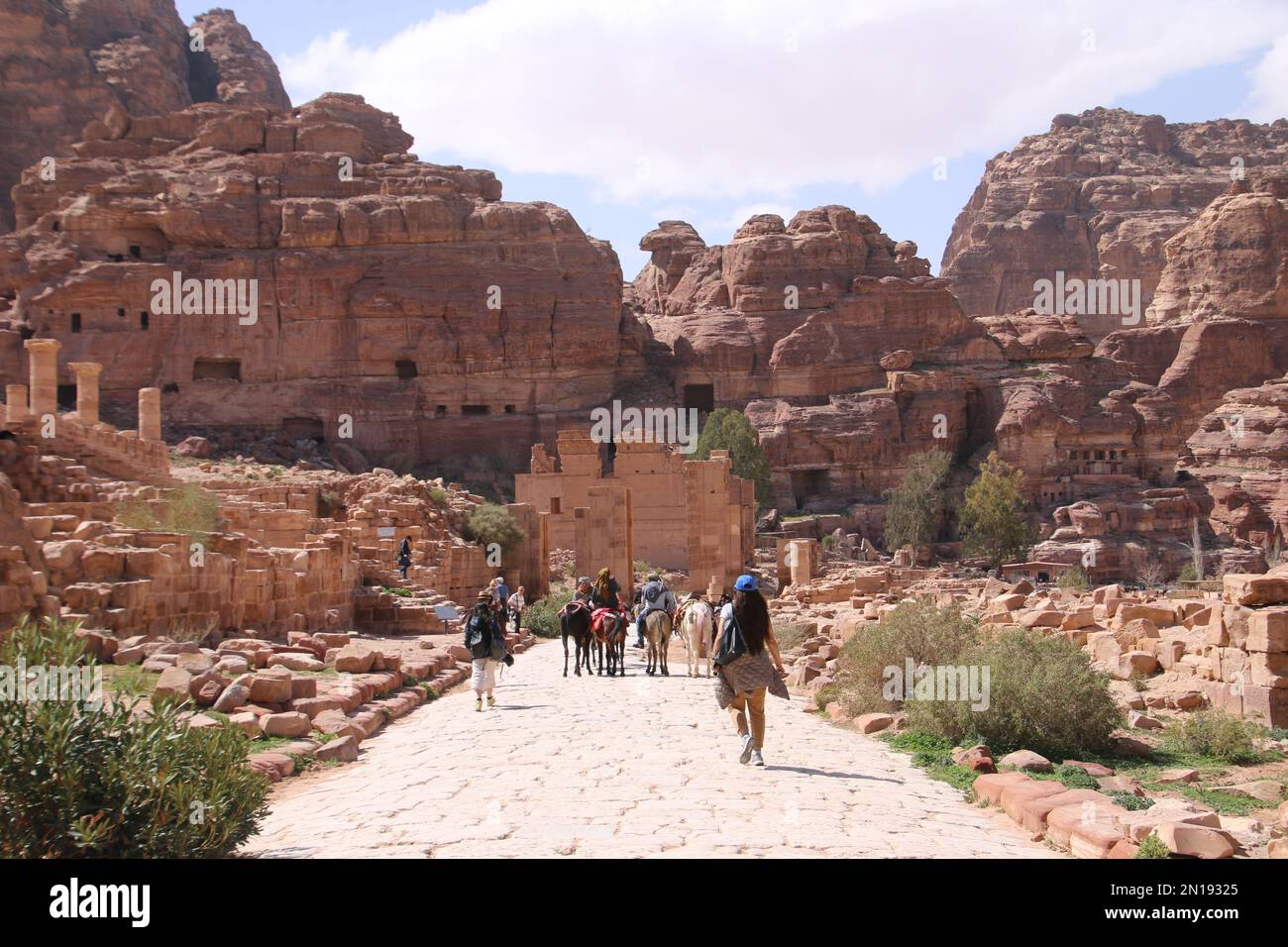 Equitazione asini Petra, Giordania Foto Stock