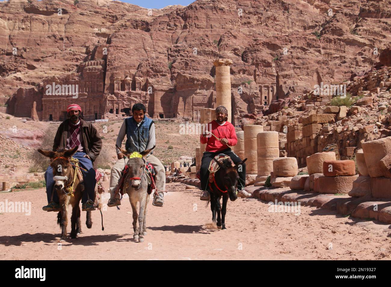 Equitazione asini Petra, Giordania Foto Stock