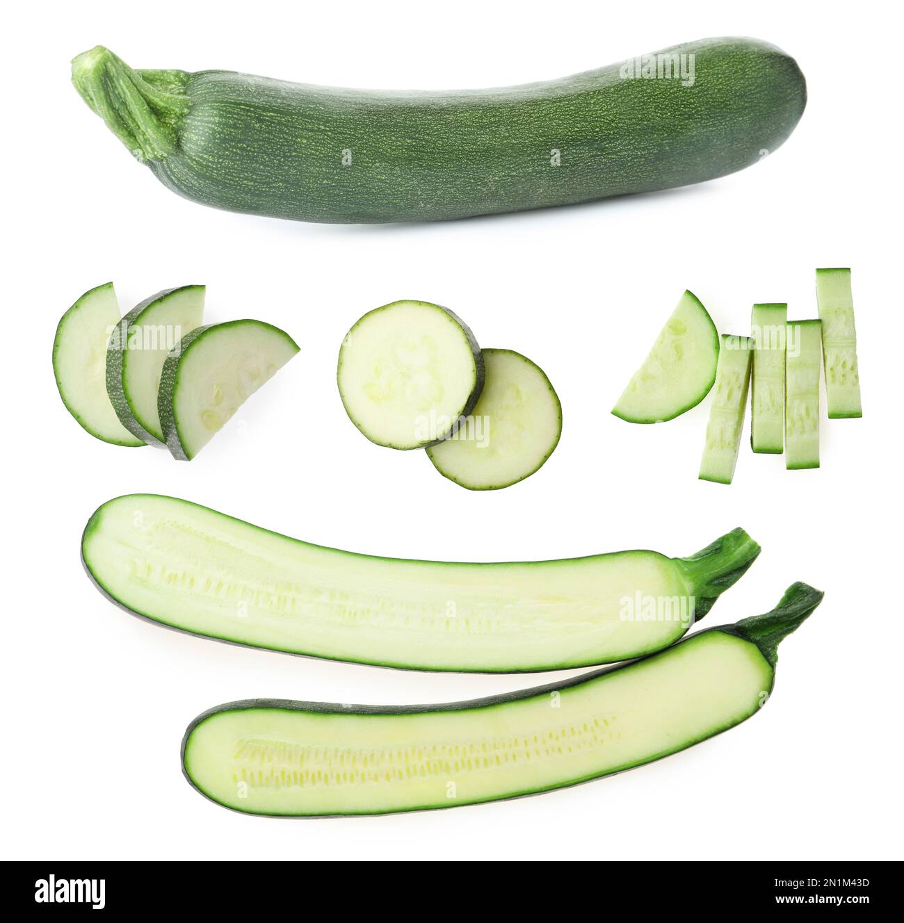 Set di zucchine fresche mature su sfondo bianco Foto Stock