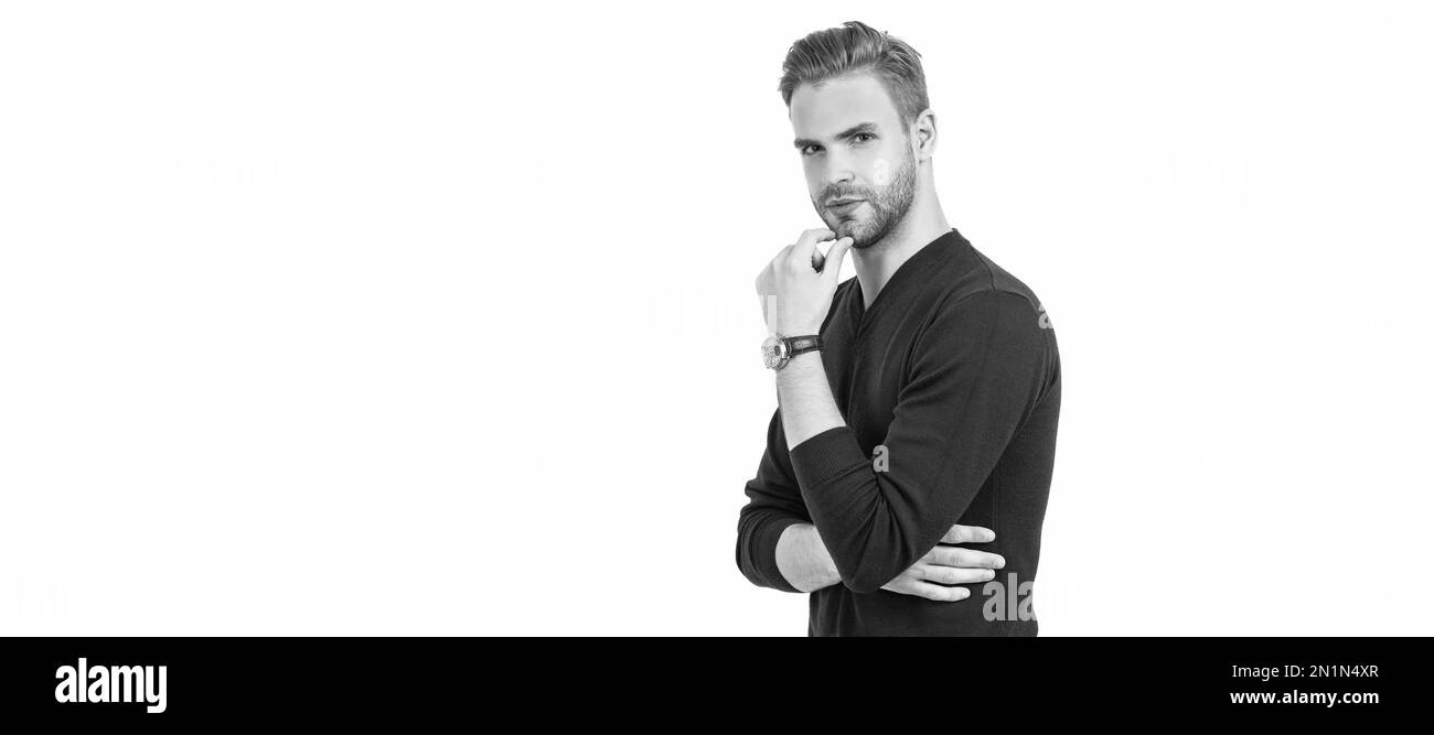 Per barba o non per barba. L'uomo bello tocca il mento non rasato. Ritratto del volto uomo, banner con spazio per la copia. Foto Stock