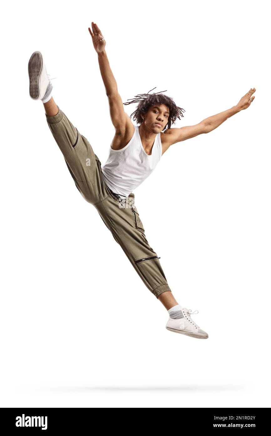 Ballerina maschile afro-americana che salta e fa un salto separato isolato su sfondo bianco Foto Stock