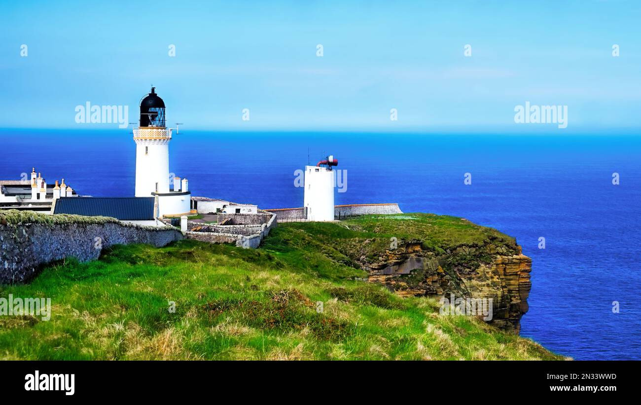 Il faro di Dunnet Head e il Pentland Firth Foto Stock