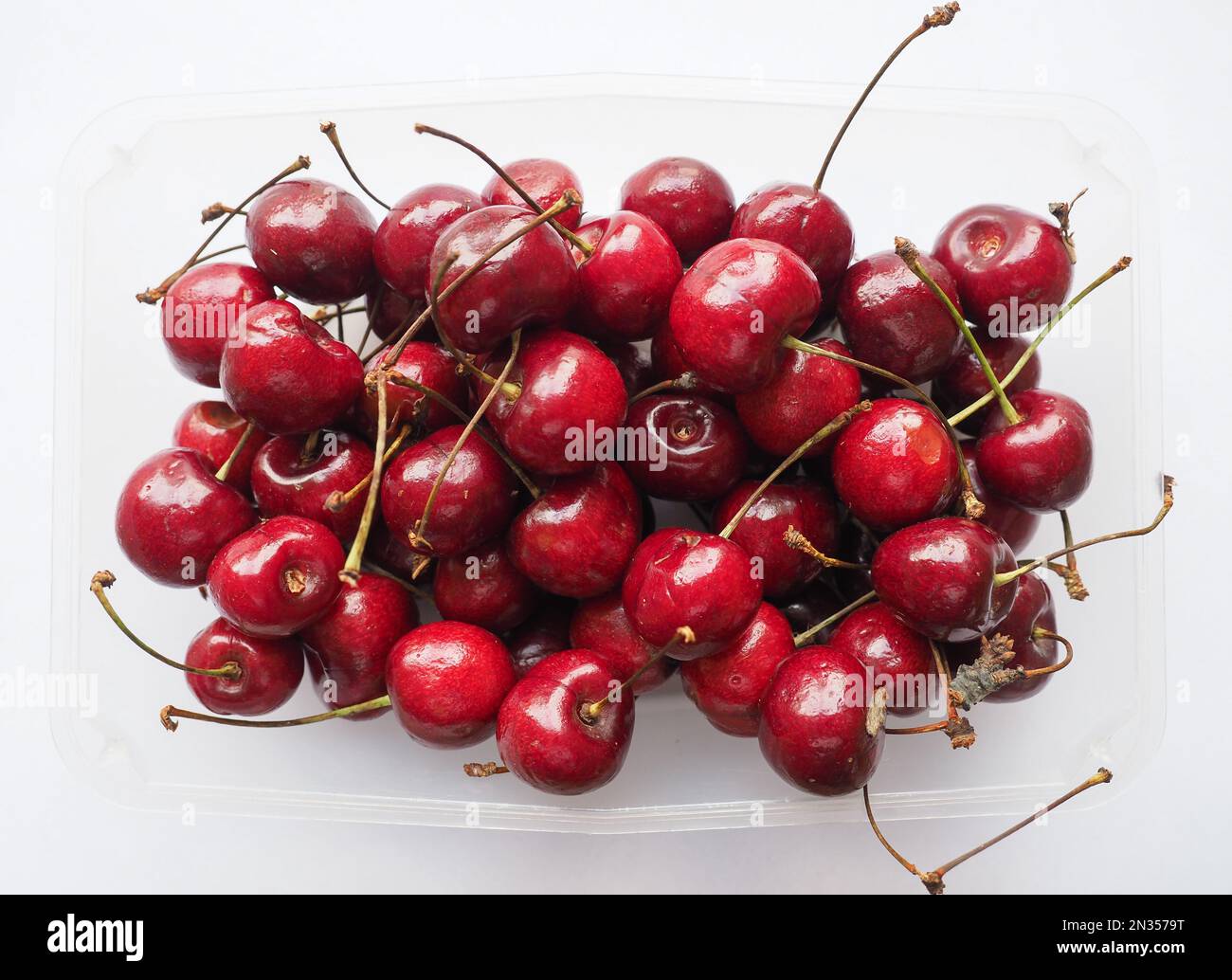 Rosso ciliegia nome scientifico Prunum vegetariano frutta alimentare Foto Stock