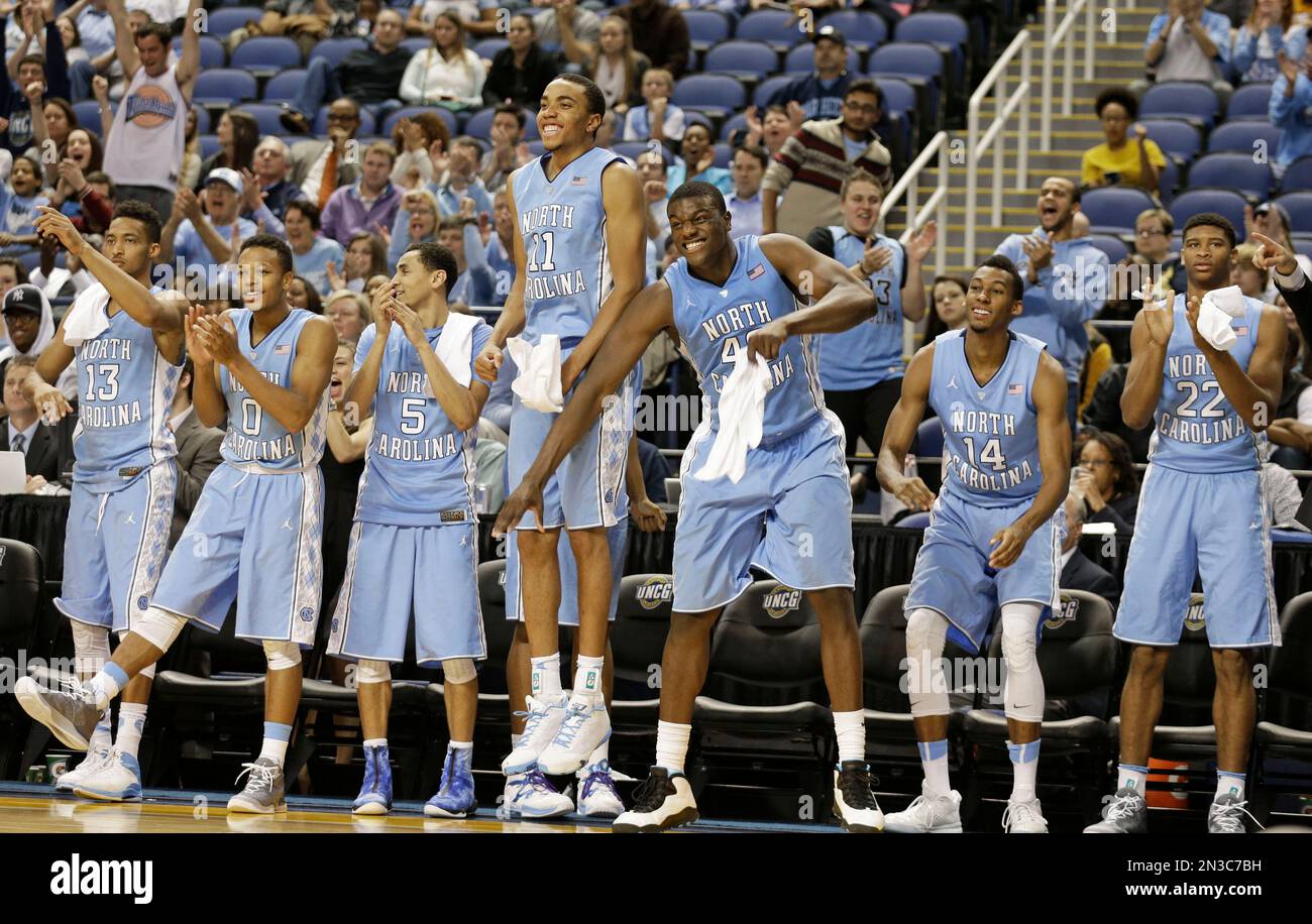 North Carolina players, from left, J.P. Tokoto, Nate Britt, Marcus