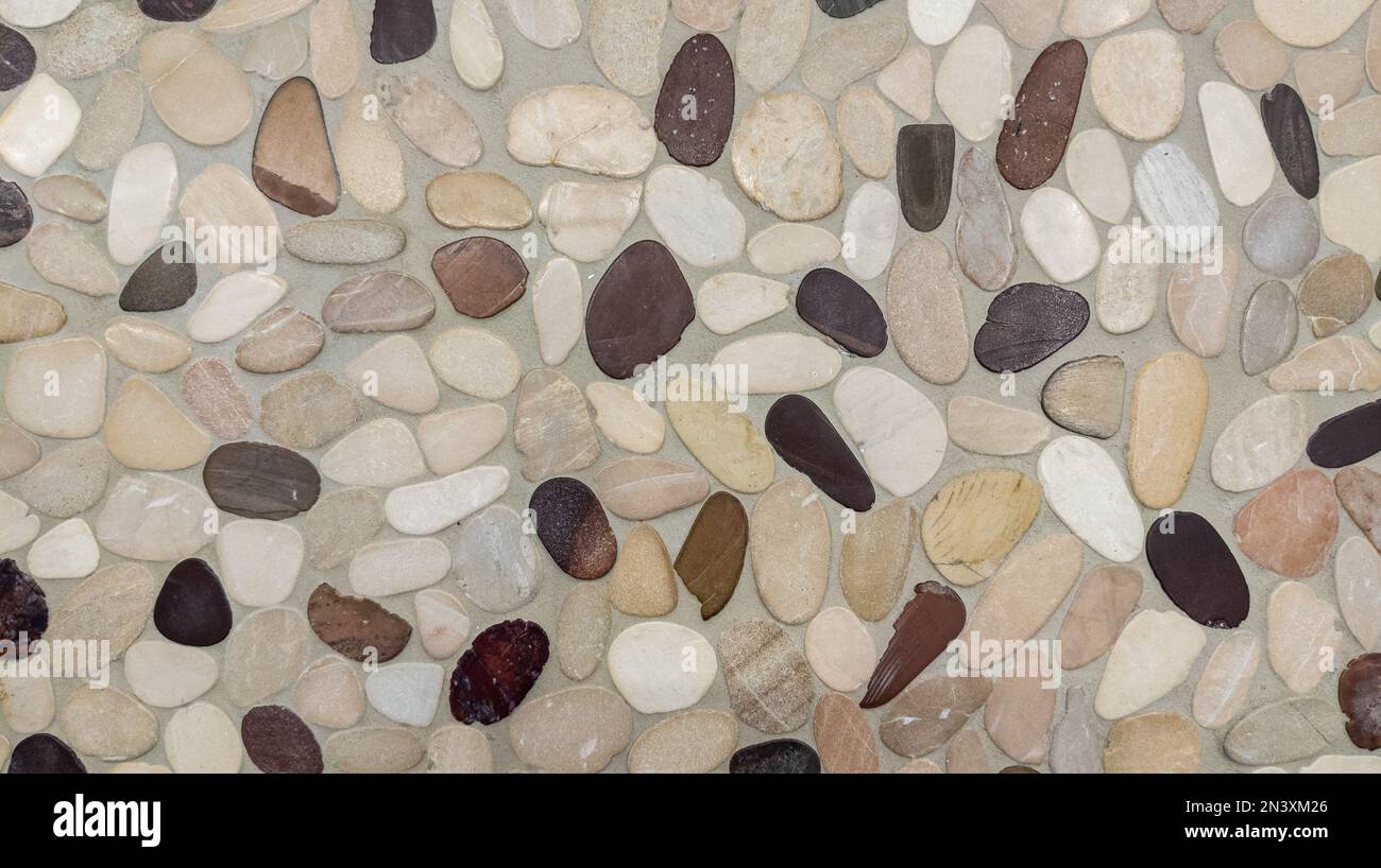 pavimento piastrellato mosaico piastrelle ciottoli per lo sfondo Foto Stock