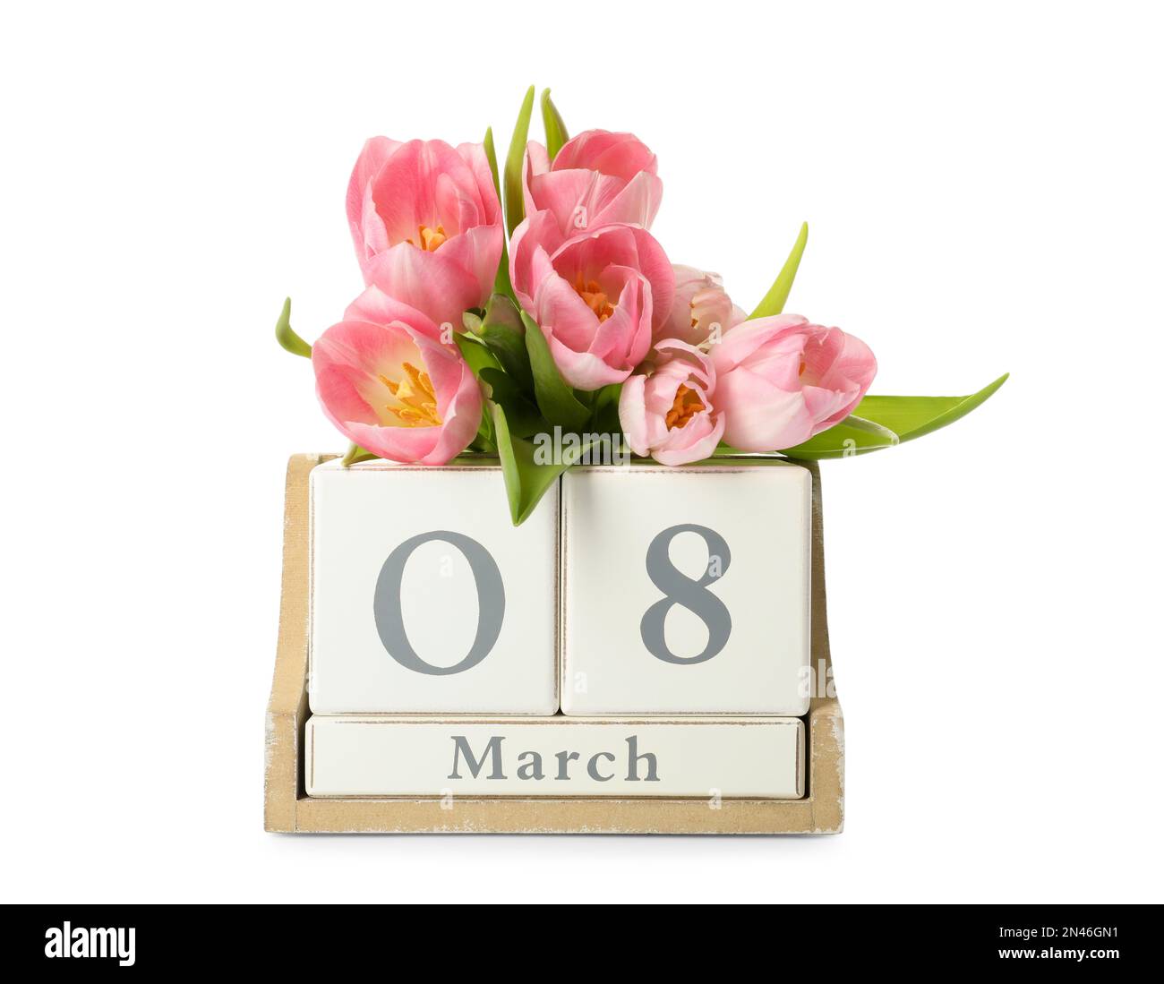Calendario blocco di legno con data 8th marzo e tulipani su sfondo bianco. Giornata internazionale della donna Foto Stock