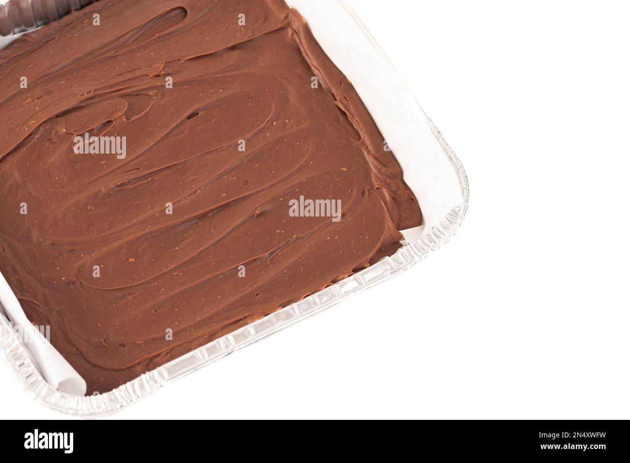 Foil Square Pan riempito con latte fatto in casa Fudge cioccolato Foto Stock