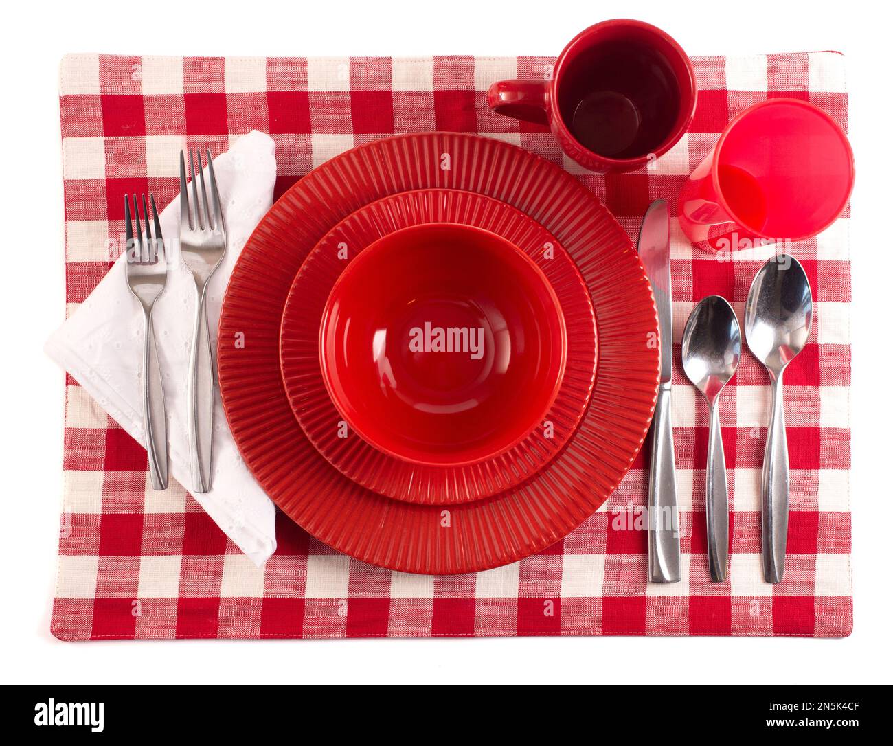 Tavolo con un Gingham Place Mat impostato per un pasto Foto Stock