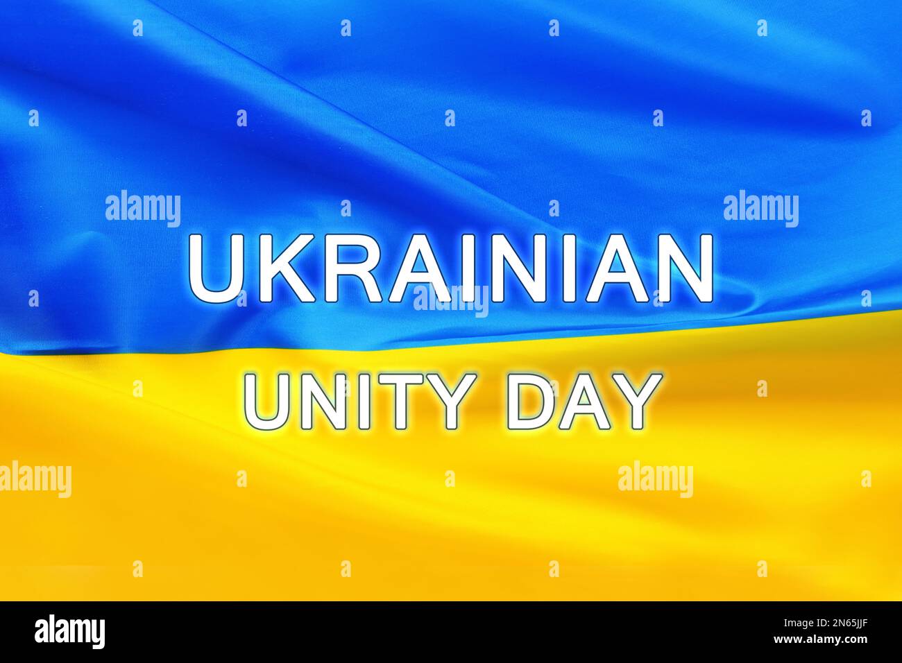 Testo della Giornata dell'unità Ucraina e della bandiera nazionale sullo sfondo Foto Stock