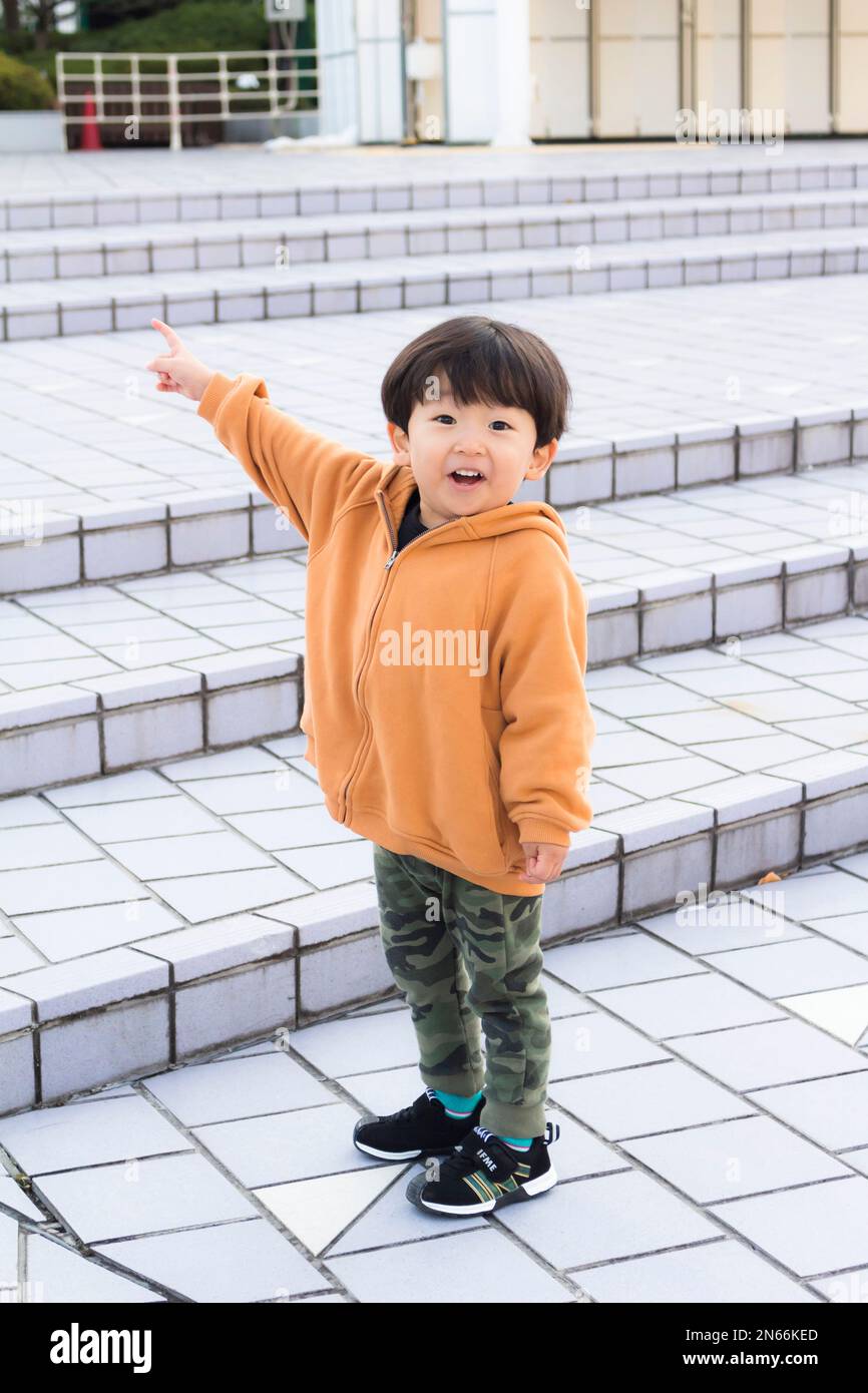 Ragazzo sorride al parco divertimenti Korakuen, 3 anni, Korakuen, Bunkyo Ku, Tokyo, Giappone, Asia orientale, Asia Foto Stock