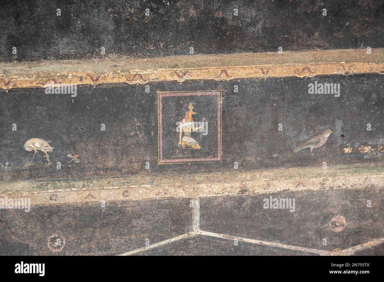 Un affresco con un dio egizio in una villa Pompiana che illustra la fusione culturale della cultura romana ed egiziana, l'Italia meridionale Foto Stock