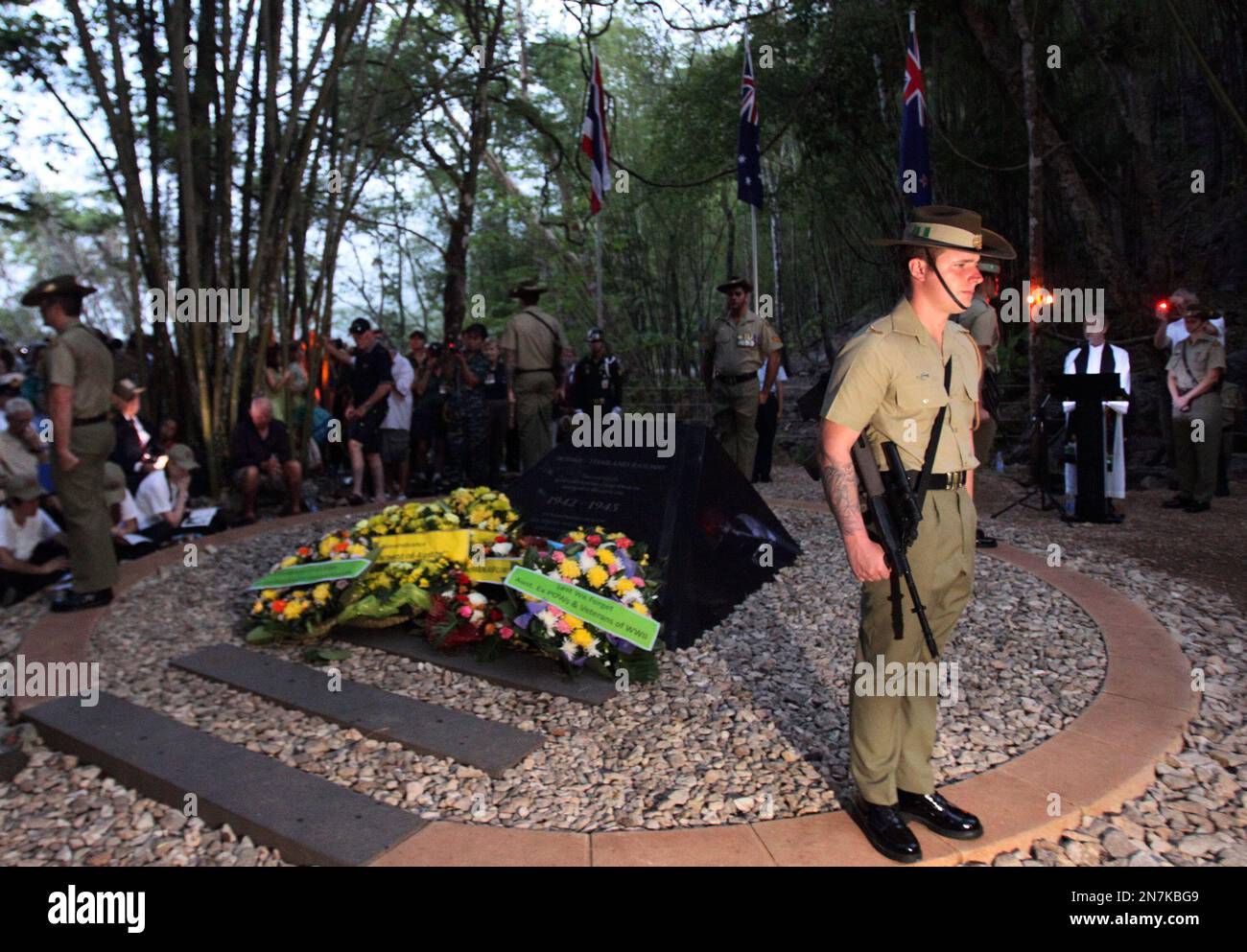Australian soldiers salute in a memorial ceremony during the ANZAC Day