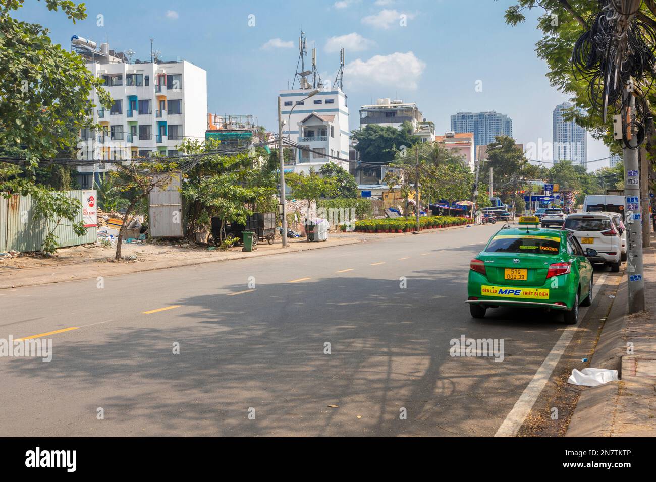 Una tranquilla scena stradale nel Distretto 2, ho Chi Minh City, Vietnam Foto Stock