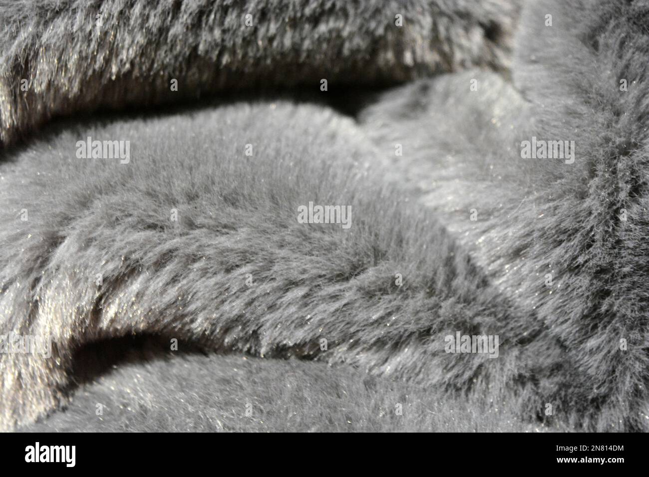 Pelliccia sfondo morbido, sintetico, non naturale grigio peluche. Foto Stock
