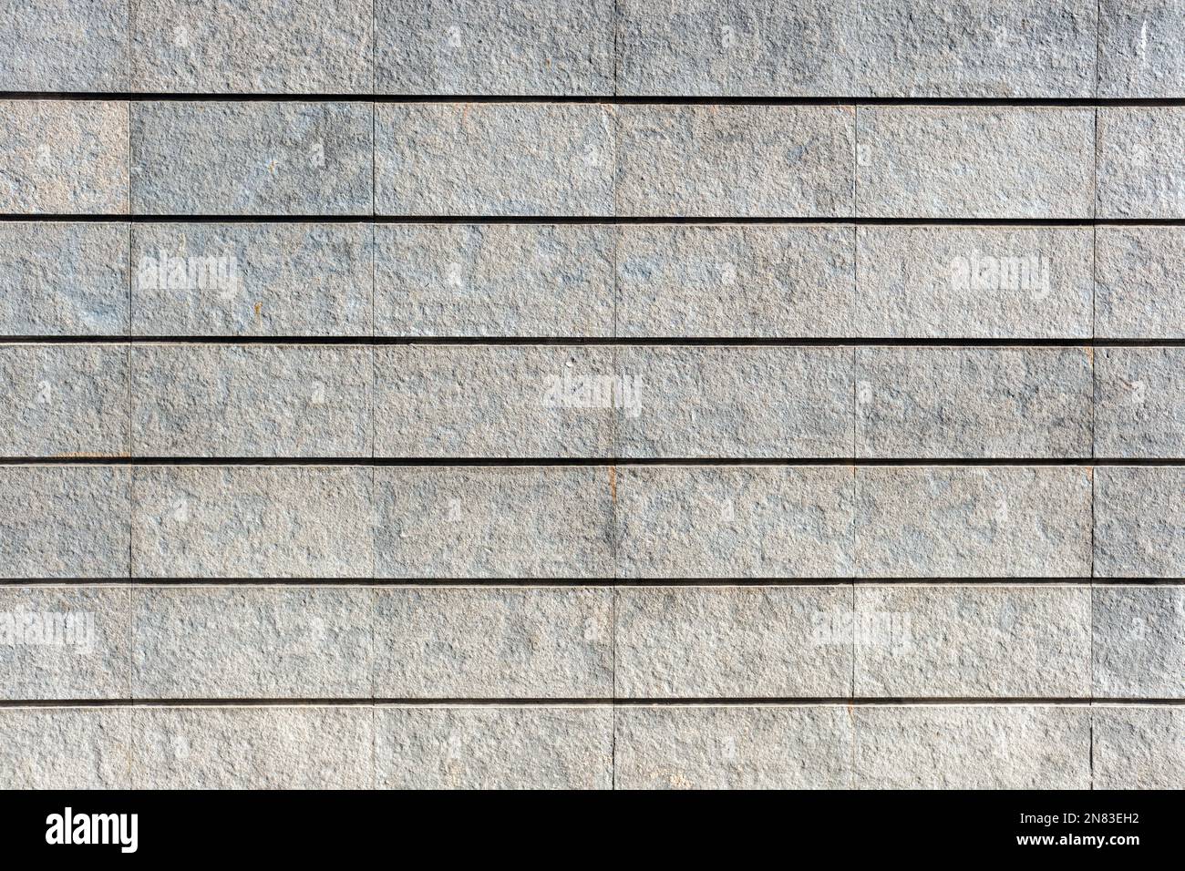 Sfondo da un muro di granito grigio Foto Stock