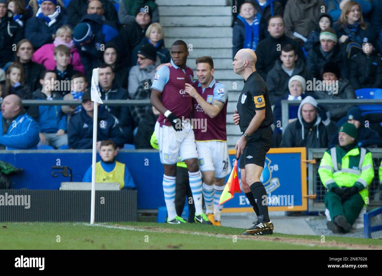 Aston Villa's Christian Benteke, left, celebrates with teammate Andreas Weimann after scoring against Everton during their English Premier League soccer match at Goodison Park Stadium, Liverpool, England, Saturday Feb. 2, 2013. (AP Photo/Jon Super) Foto Stock