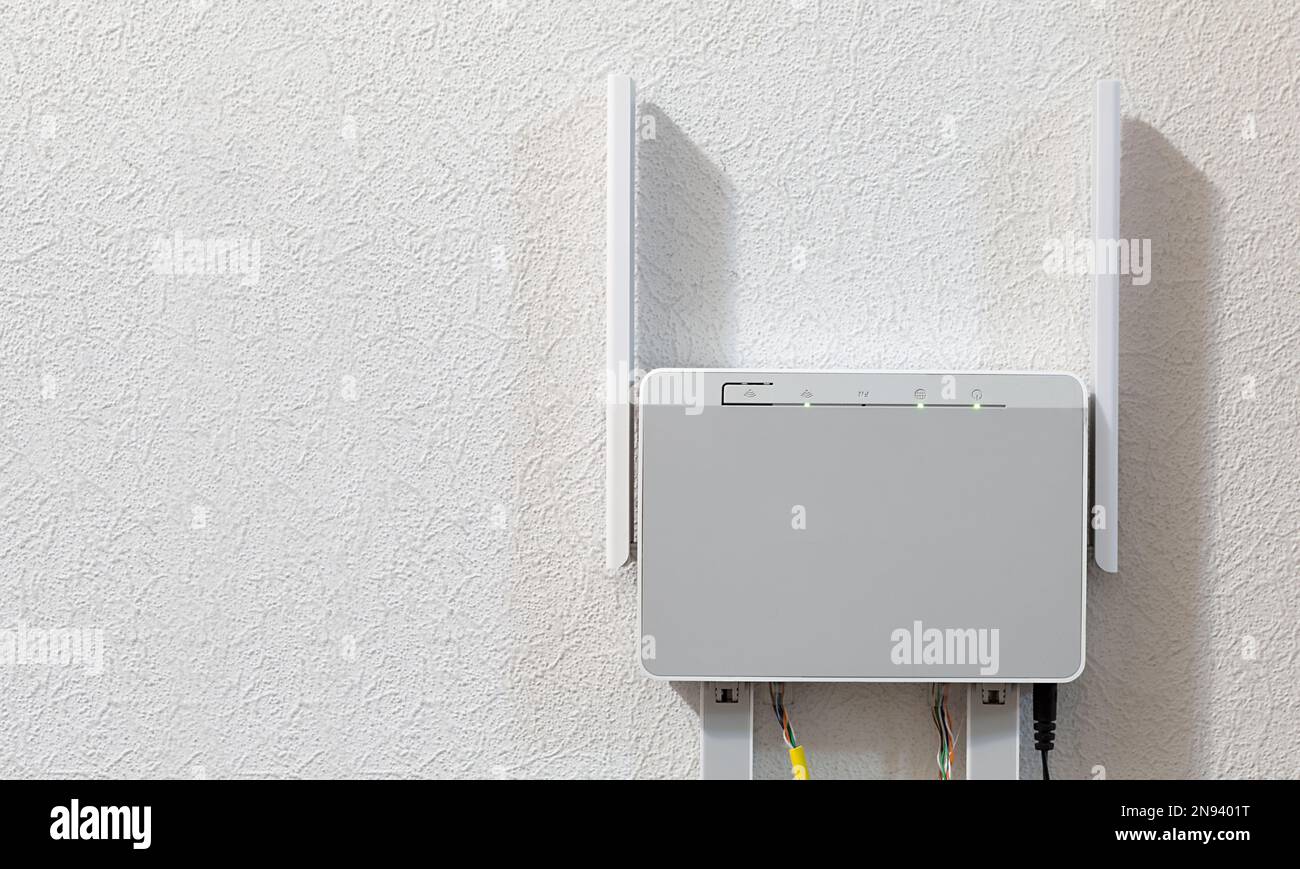 Router domestico dual-band a parete, copyspace Foto Stock