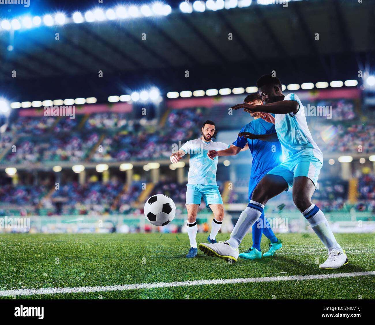 Scena di calcio con giocatori di calcio in competizione allo stadio completo Foto Stock