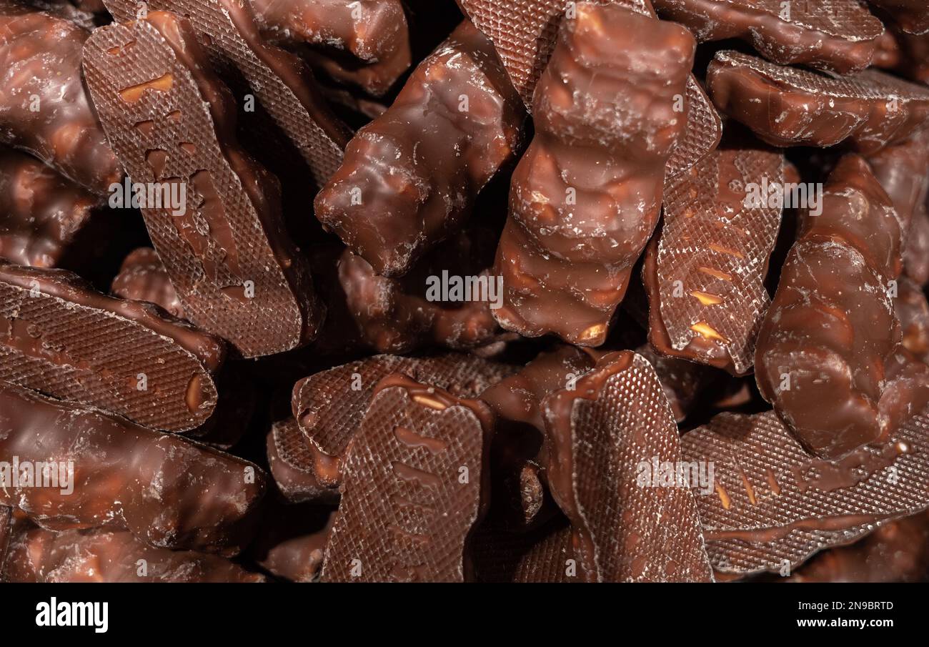 Immagine di sfondo fatta di biscotti e dolci al cioccolato Foto Stock