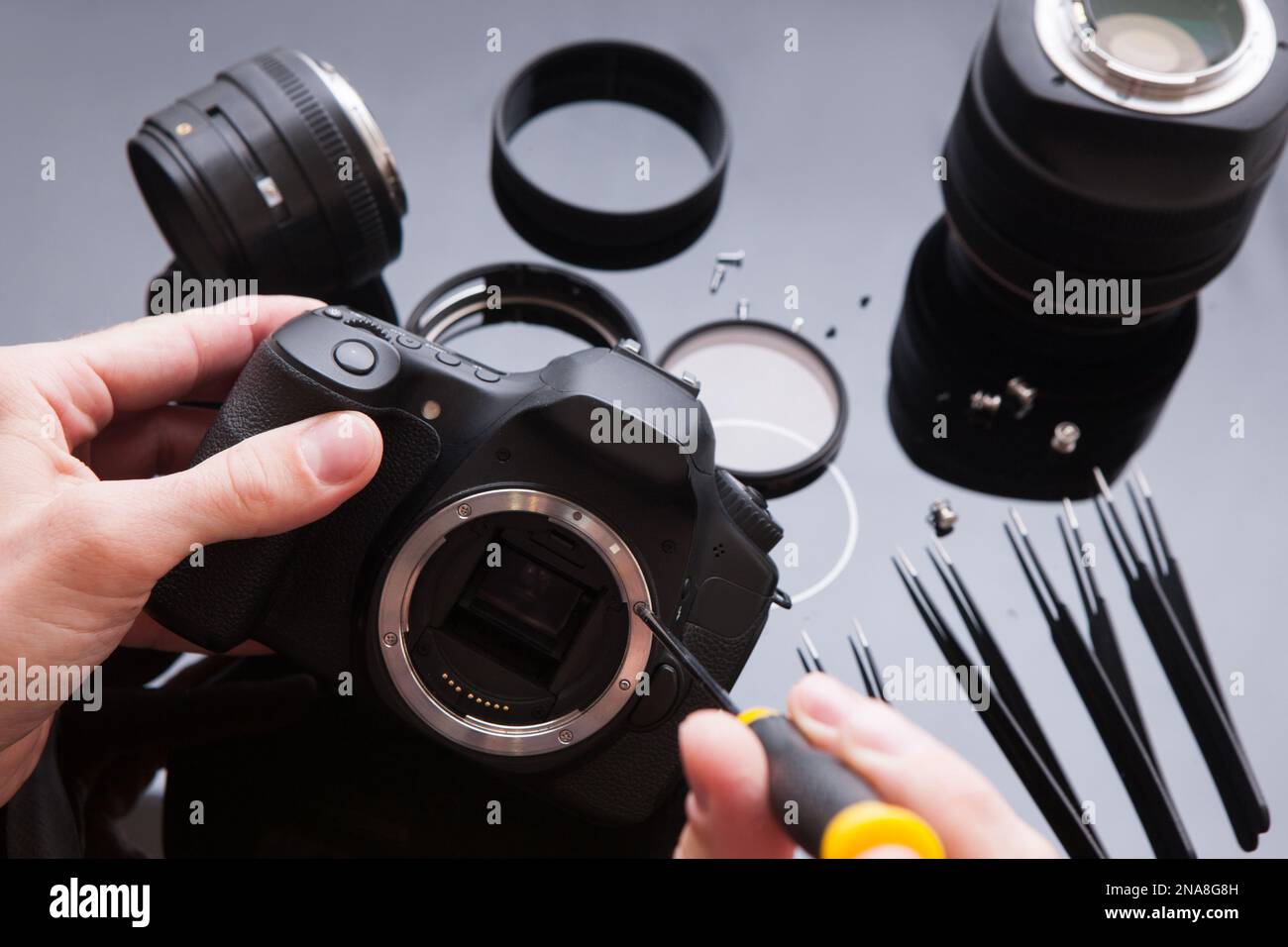 Set di riparazione fotocamera. Supporto per la manutenzione Foto Stock