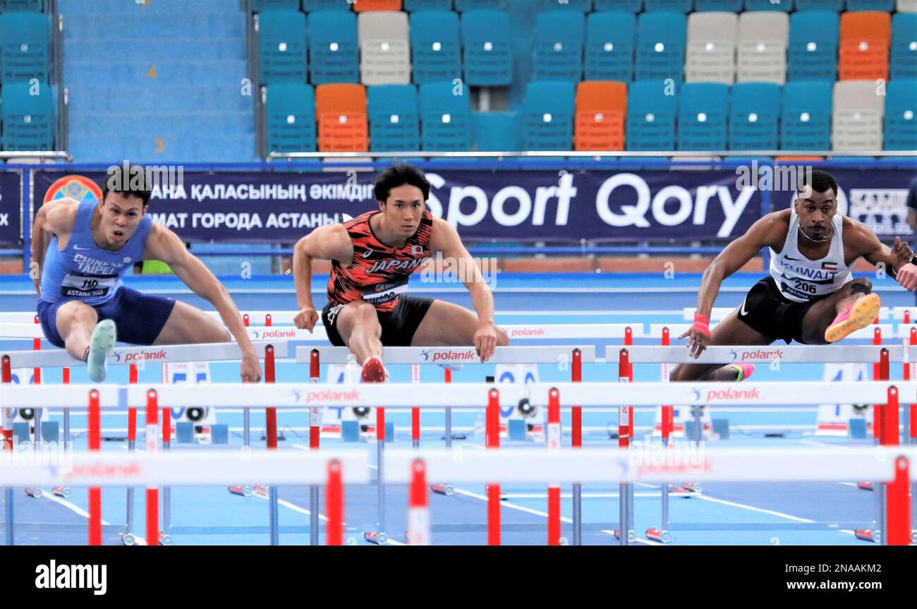 Astana, Kazakistan. 12th Feb, 2023. Ishikawa Shuhei (C) del Giappone compete durante la finale maschile a 60m ostacoli ai campionati asiatici di atletica indoor 10th ad Astana, Kazakistan, 12 febbraio 2023. Credit: Kalizhan Ospanov/Xinhua/Alamy Live News Foto Stock