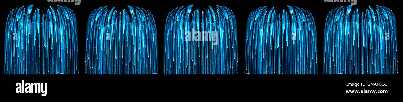 Le luci si illuminano utilizzando tecniche di zoom, l'effetto dello zoom avanti e indietro della fotocamera durante le riprese Foto Stock