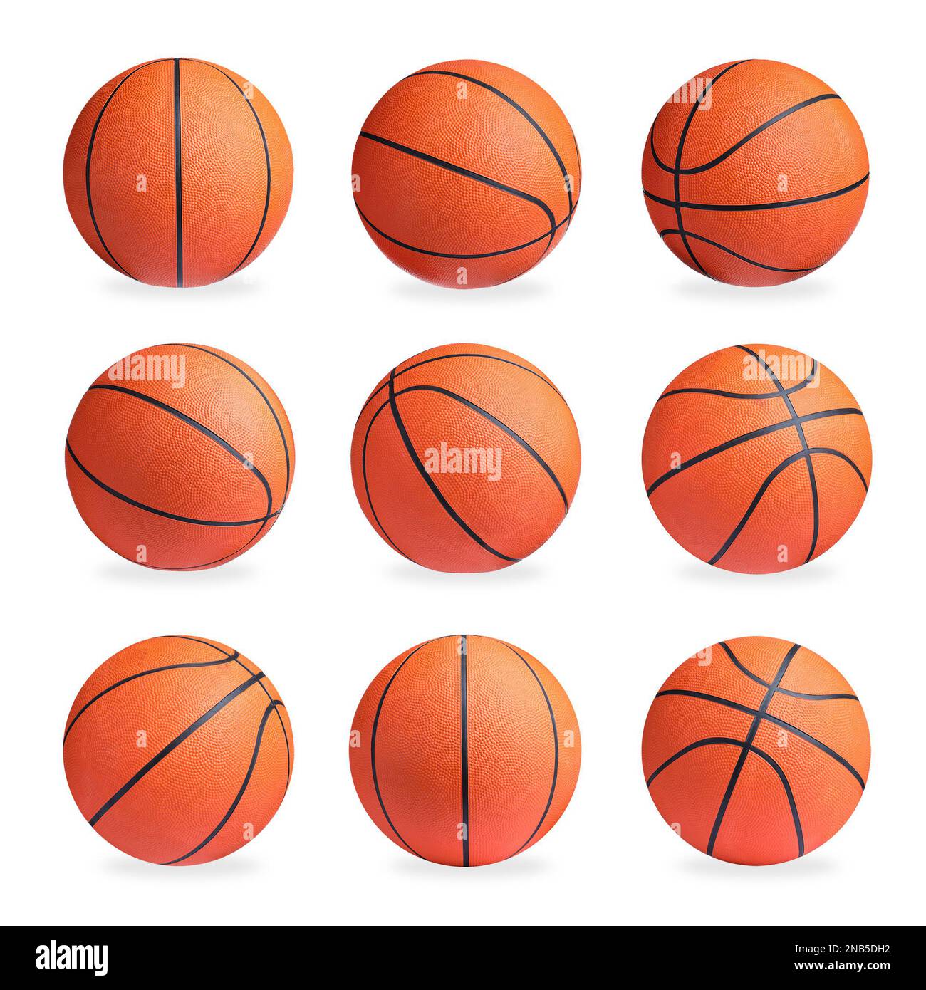 Set con palline da basket luminose su sfondo bianco Foto Stock