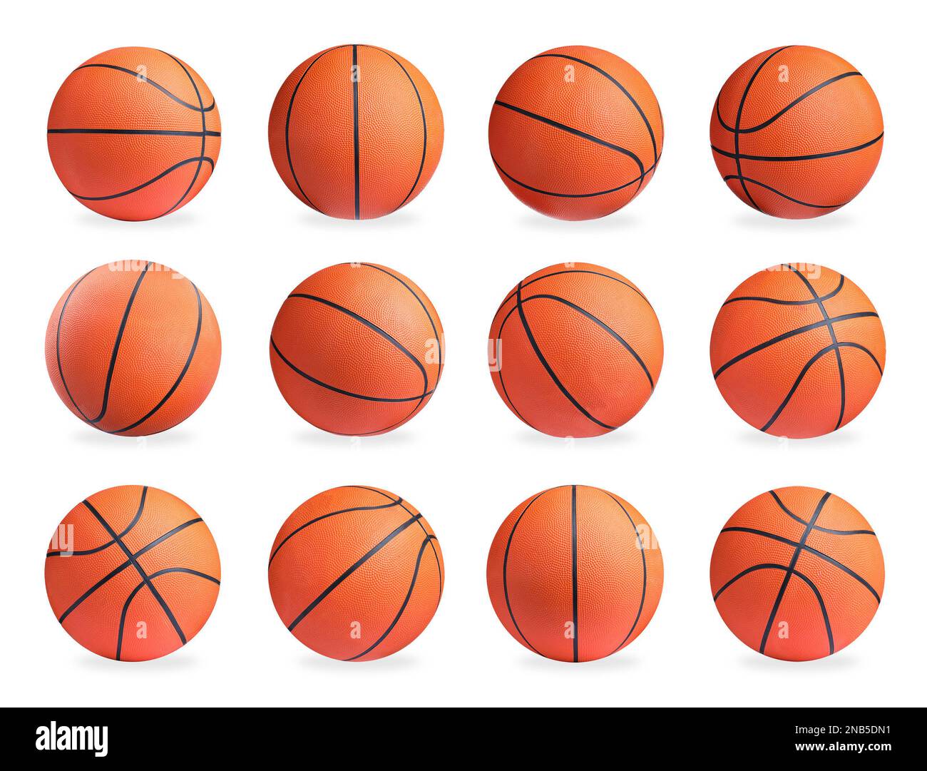 Set con palline da basket luminose su sfondo bianco Foto Stock