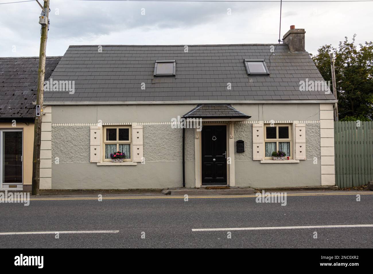 Residenza tipica, scena di strada, Listowel, Irlanda Foto Stock