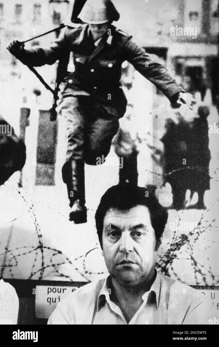 Former East German soldier Conrad Schumann sits in front of a