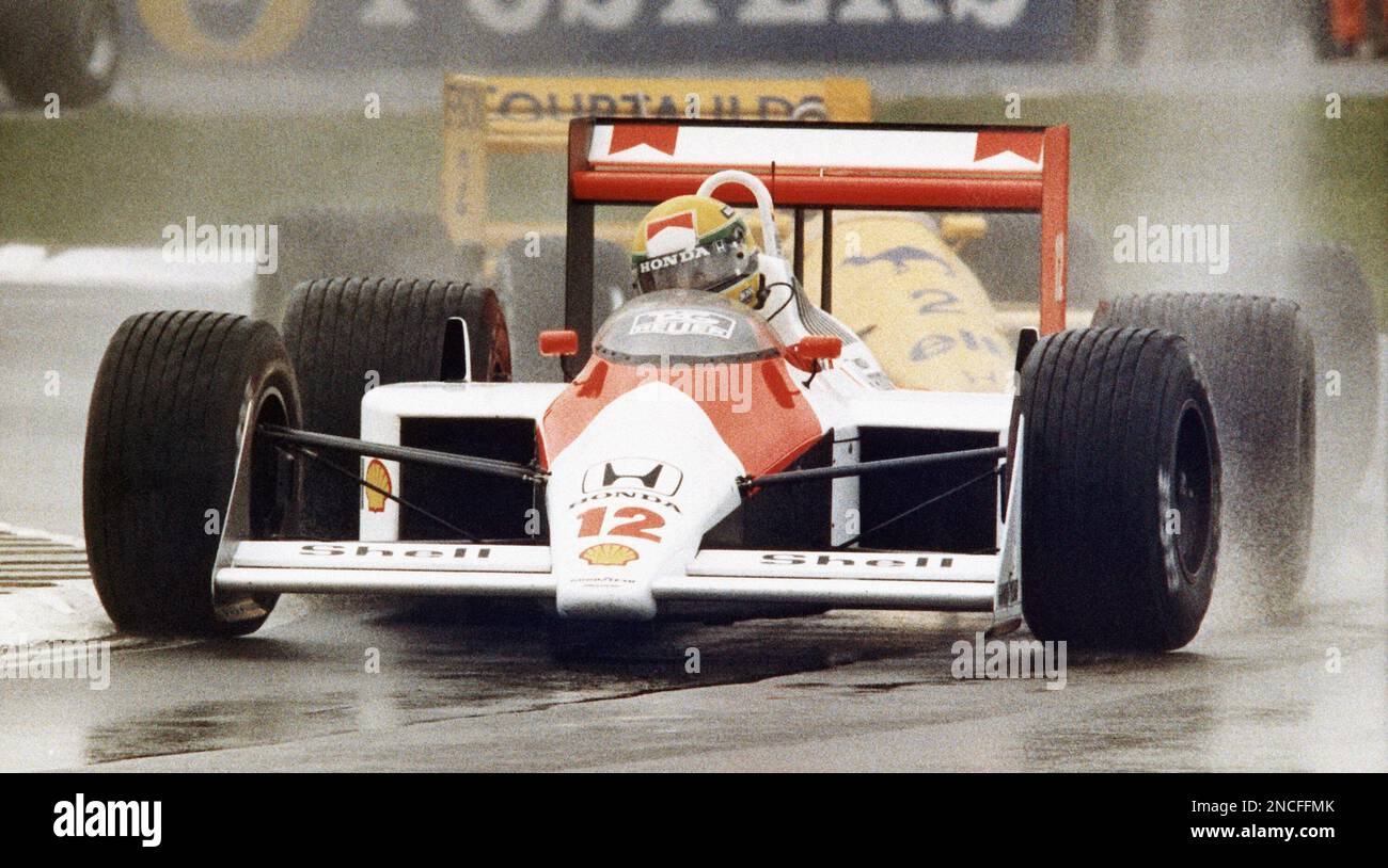 Brazil’s Ayrton Senna driving his Honda Marlboro McLaren closely chased ...