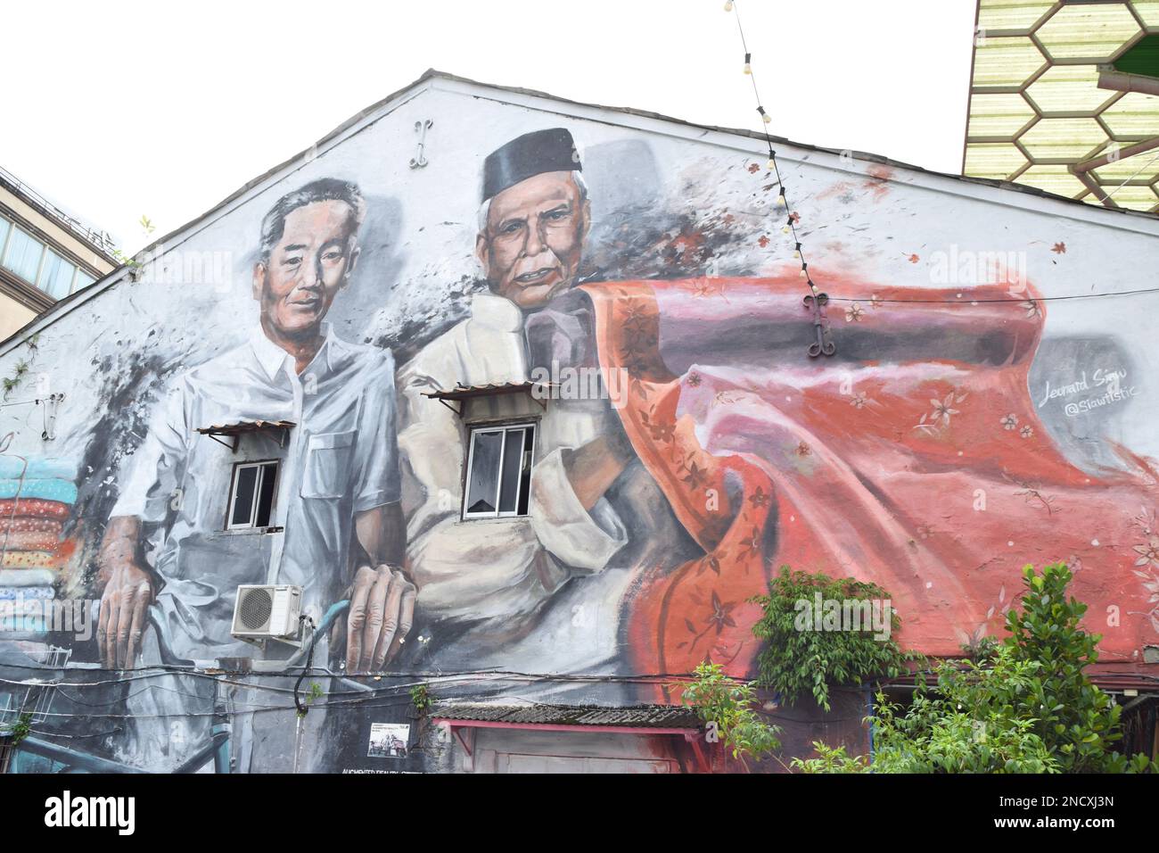 Murale dipinto nel centro della città di Kuching in Malesia. Foto Stock