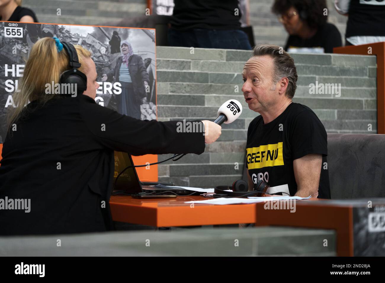 HILVERSUM - Joris Linssen sulla call panel durante la giornata nazionale di azione del giro 555. Il denaro viene raccolto attraverso varie campagne per le vittime dei terremoti in Turchia e Siria. ANP JEROEN JUMELET olanda fuori - belgio fuori Foto Stock