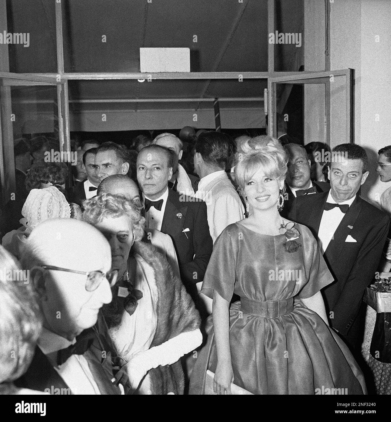 Pretty young actress Annette Vadim, wife of French film producer Roger Vadim, arrives at night on May 4, 1960 at the Cannes Film Festival Palais. An elegant gala took place in this Riviera resort for the opening night of the 1960 Cannes Film Festival. (AP Photo) Foto Stock