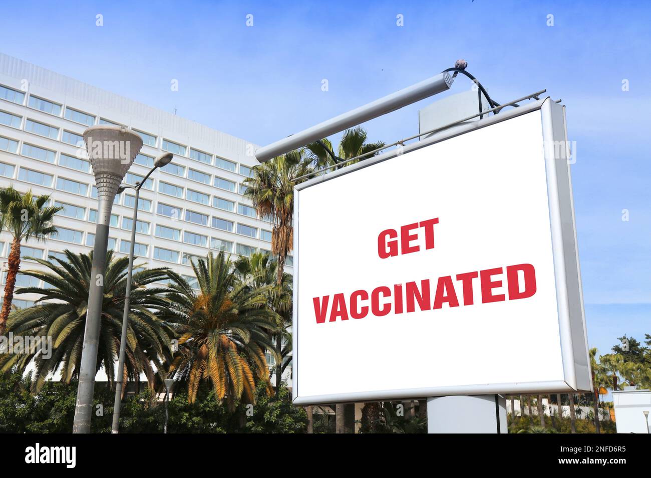 Cartello Get vaccinated affissioni. Poster della città per la promozione del vaccino. Foto Stock