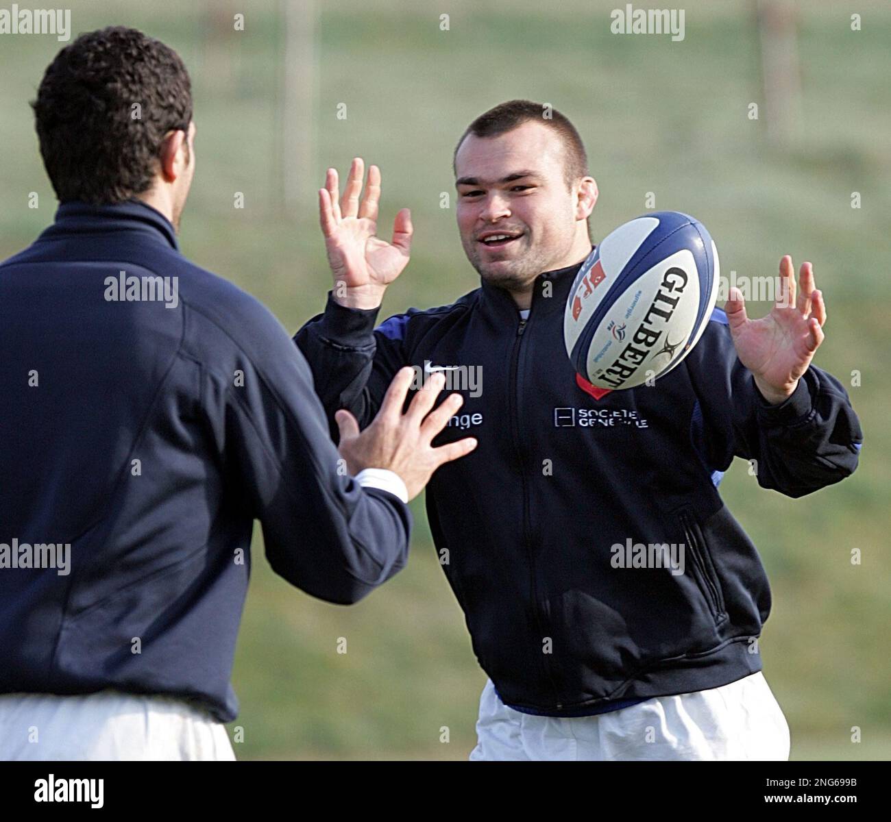 French national rugby team player Nicolas Mas throws the ball during a  training session in Marcoussis, south of Paris, Tuesday Feb. 20, 2007.  France will play against Wales next Saturday in Saint