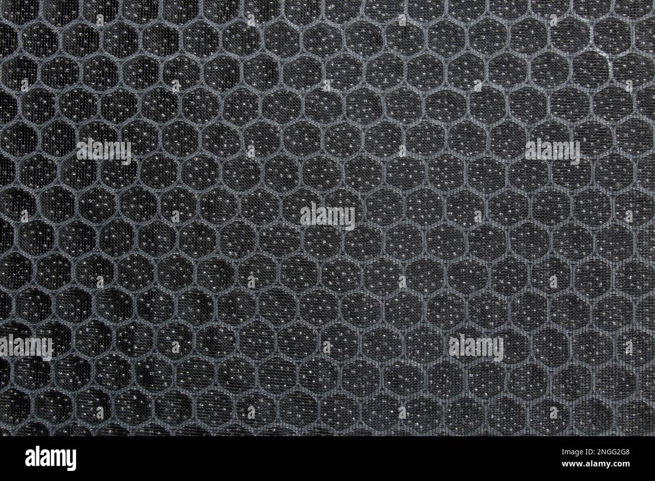 filtro a carbone per la purificazione dell'aria sotto forma di nido d'ape come sfondo Foto Stock