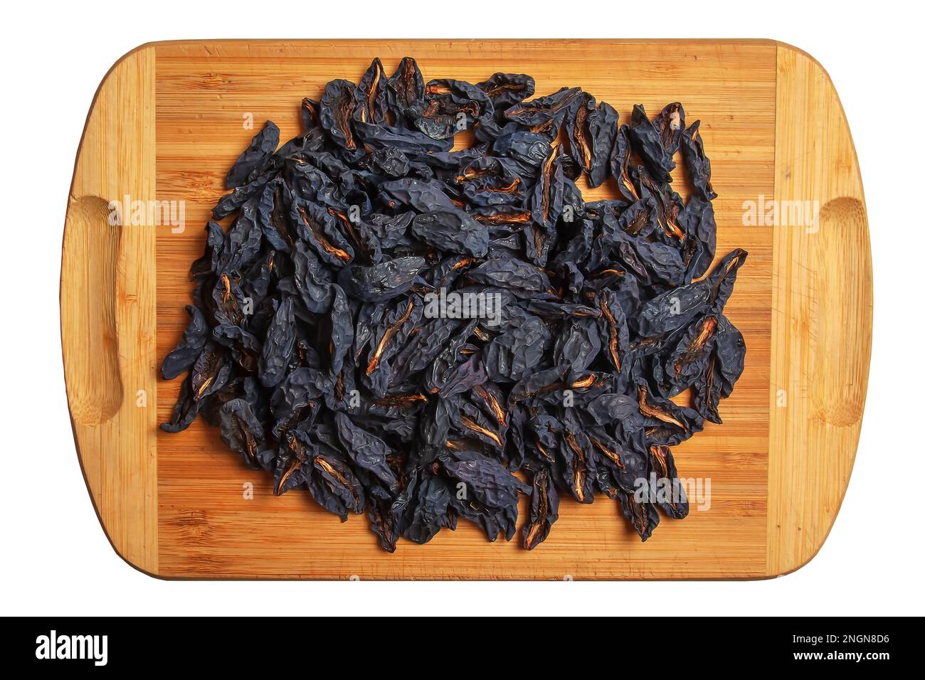 Prugne secche, snocciolate. Fondo di prugne secche o prugne. Concetto di cibo sano Foto Stock