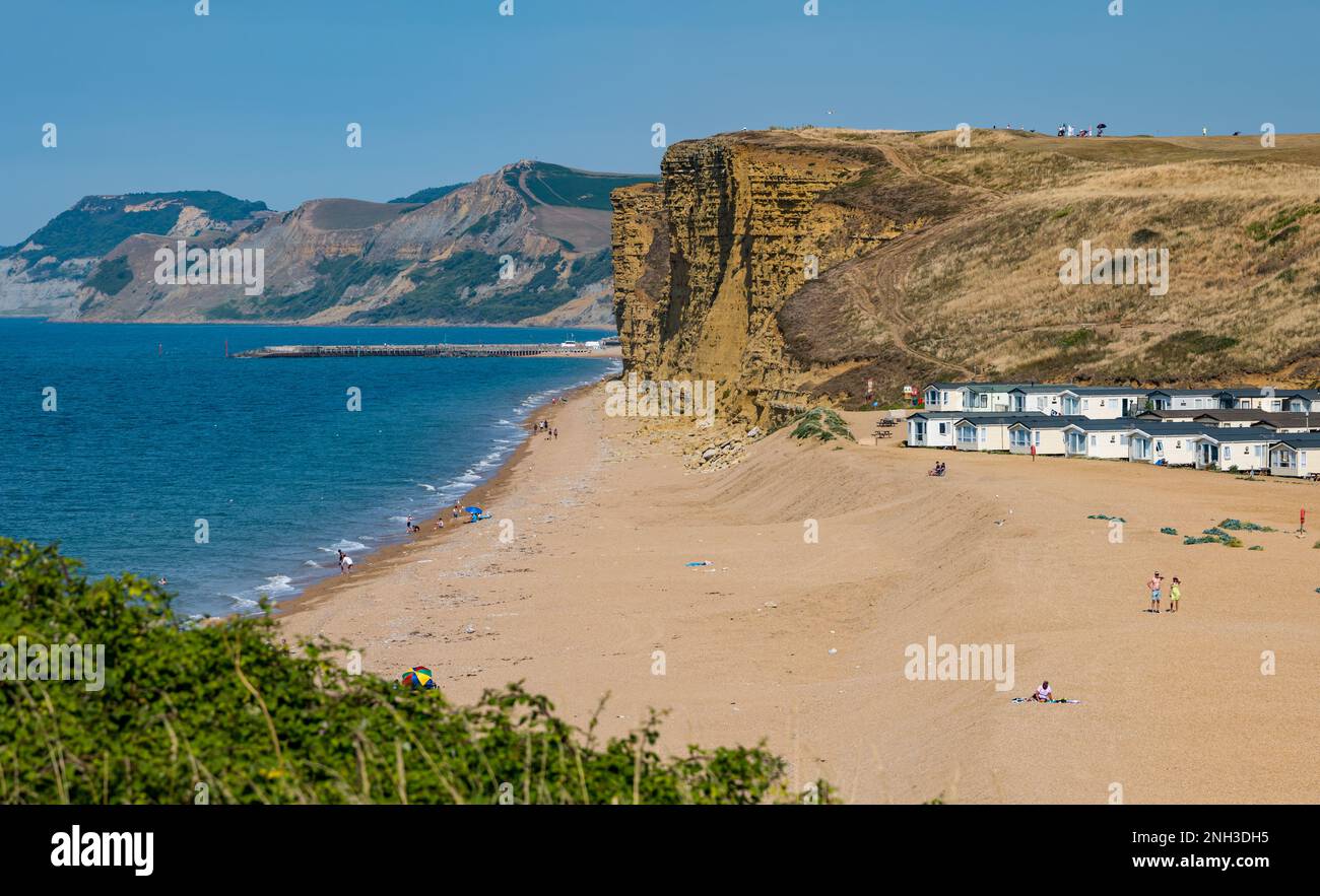 Case mobili vacanza alloggio sulla spiaggia vicino a scogliere calcaree, Jurassic costa, Burton Freshwater, Dorset, Inghilterra, REGNO UNITO Foto Stock